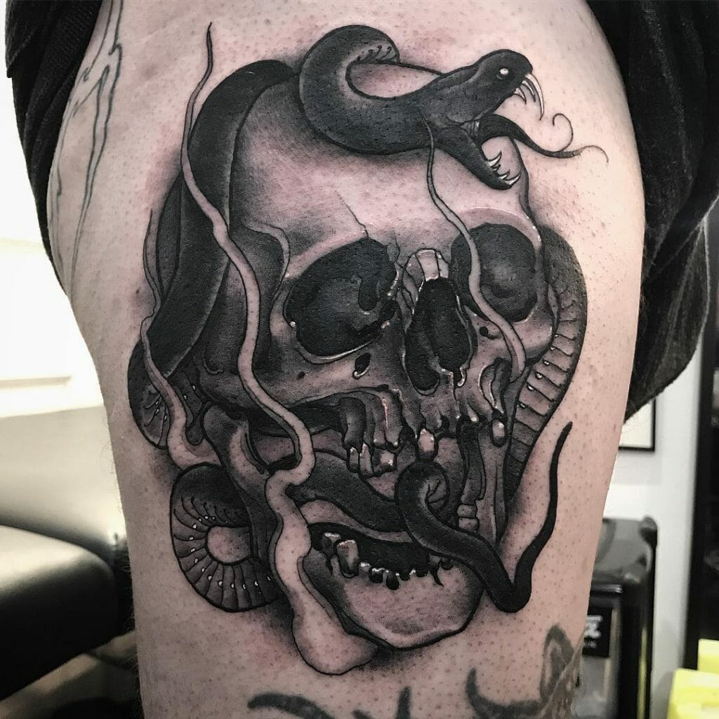 Black And White Ink Snake On Skull Tattoo
