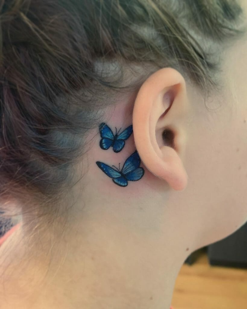 Blue Butterfly Face Tattoo