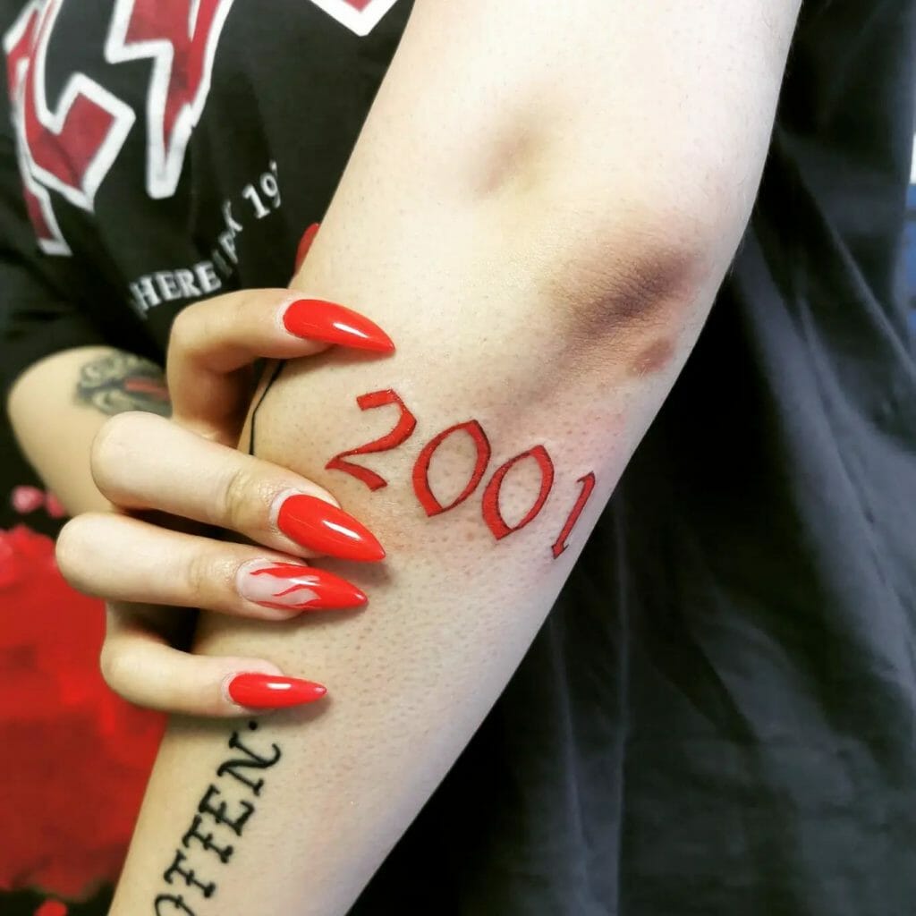 Bright Red 2001 Arm Tattoo