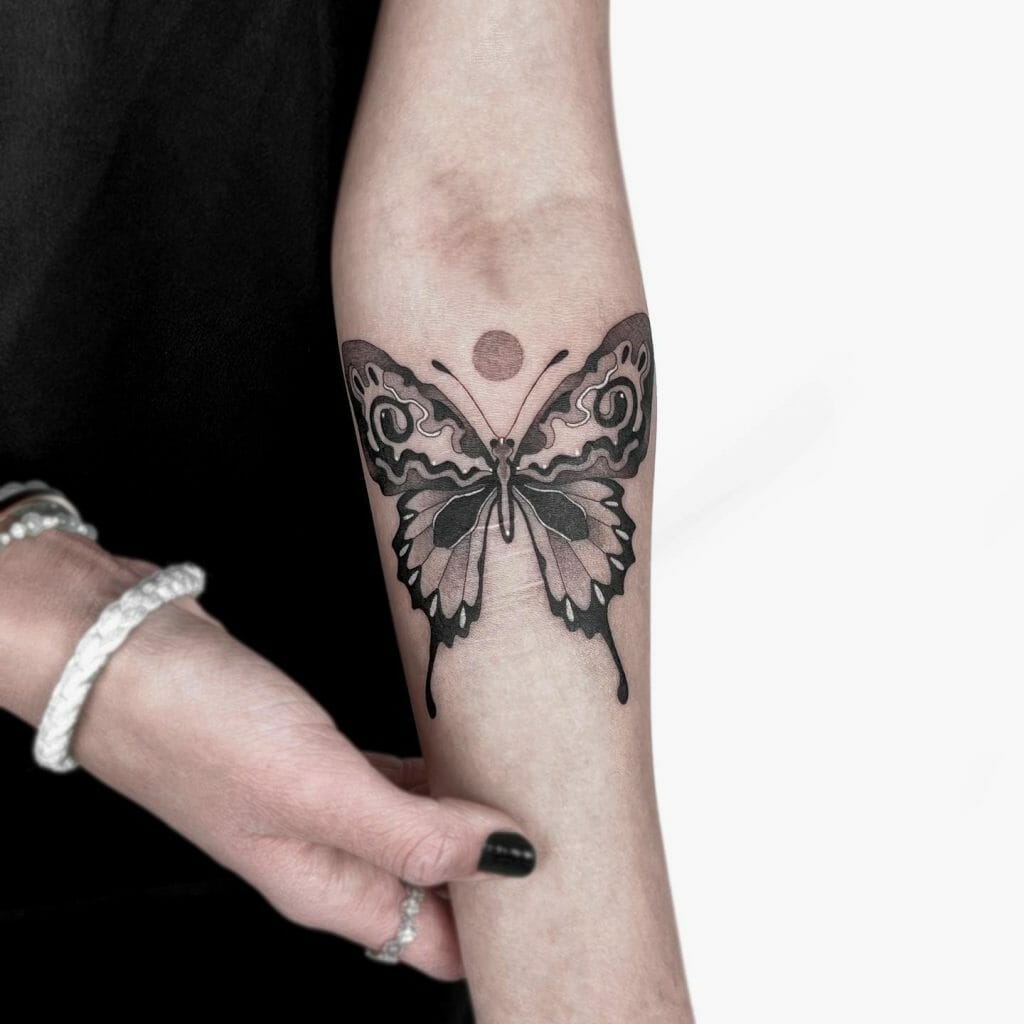 Butterfly With A Moon Tattoo