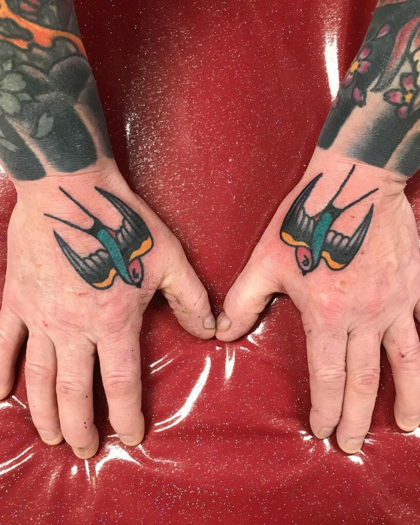Coloured Swallow Hand Tattoo On Both Hands