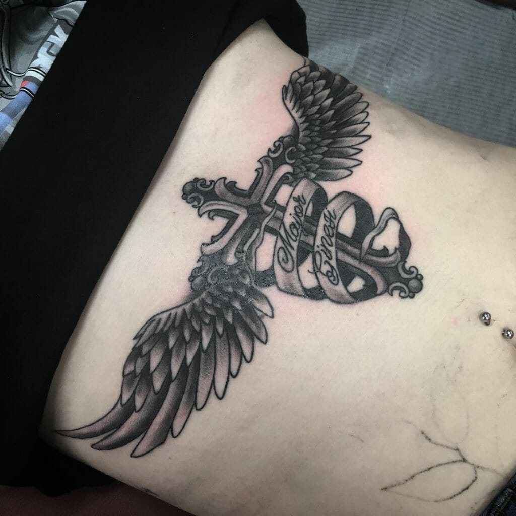 Dedicated Cross With Wings Tattoo Design