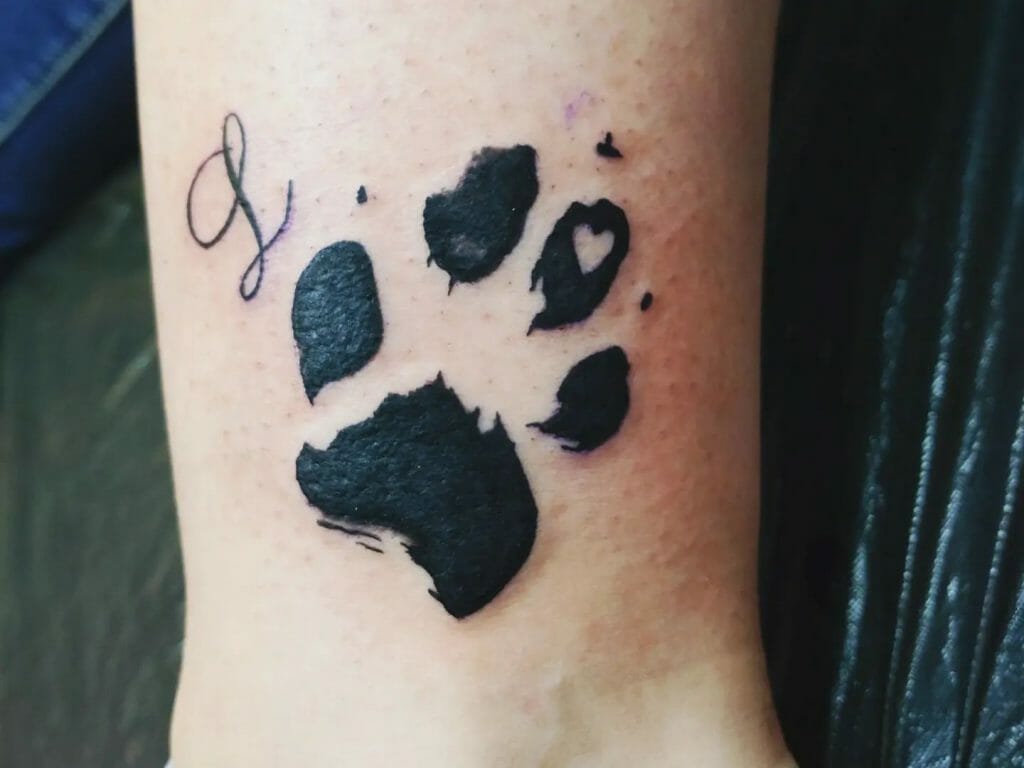Dog Paw Tattoos With Just The Initial Of Your Pet