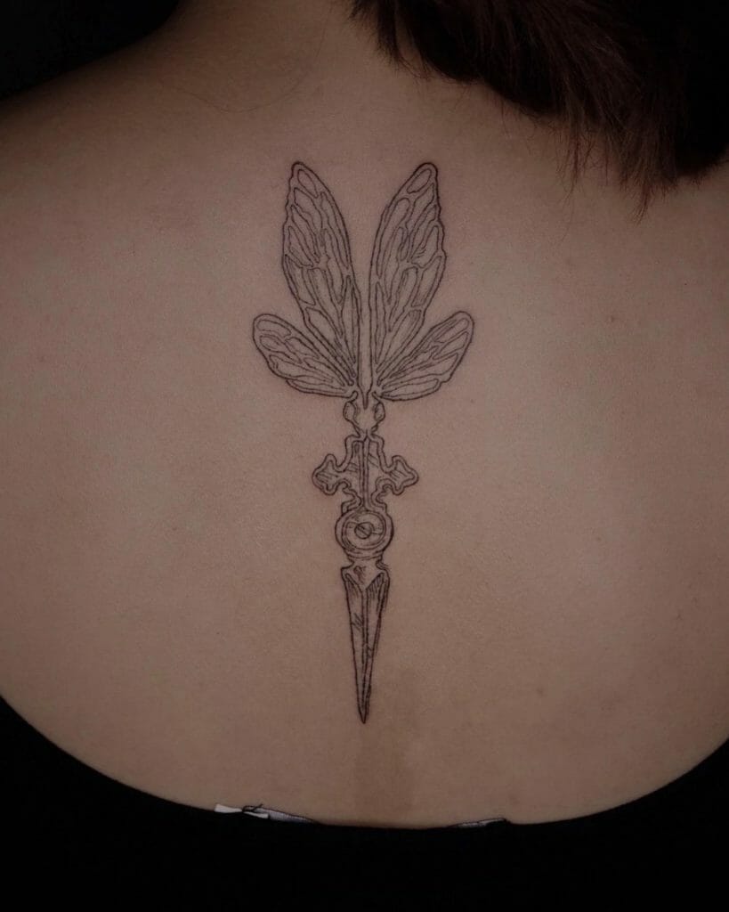 Dragonfly Tattoo Design With Sword Motif ideas