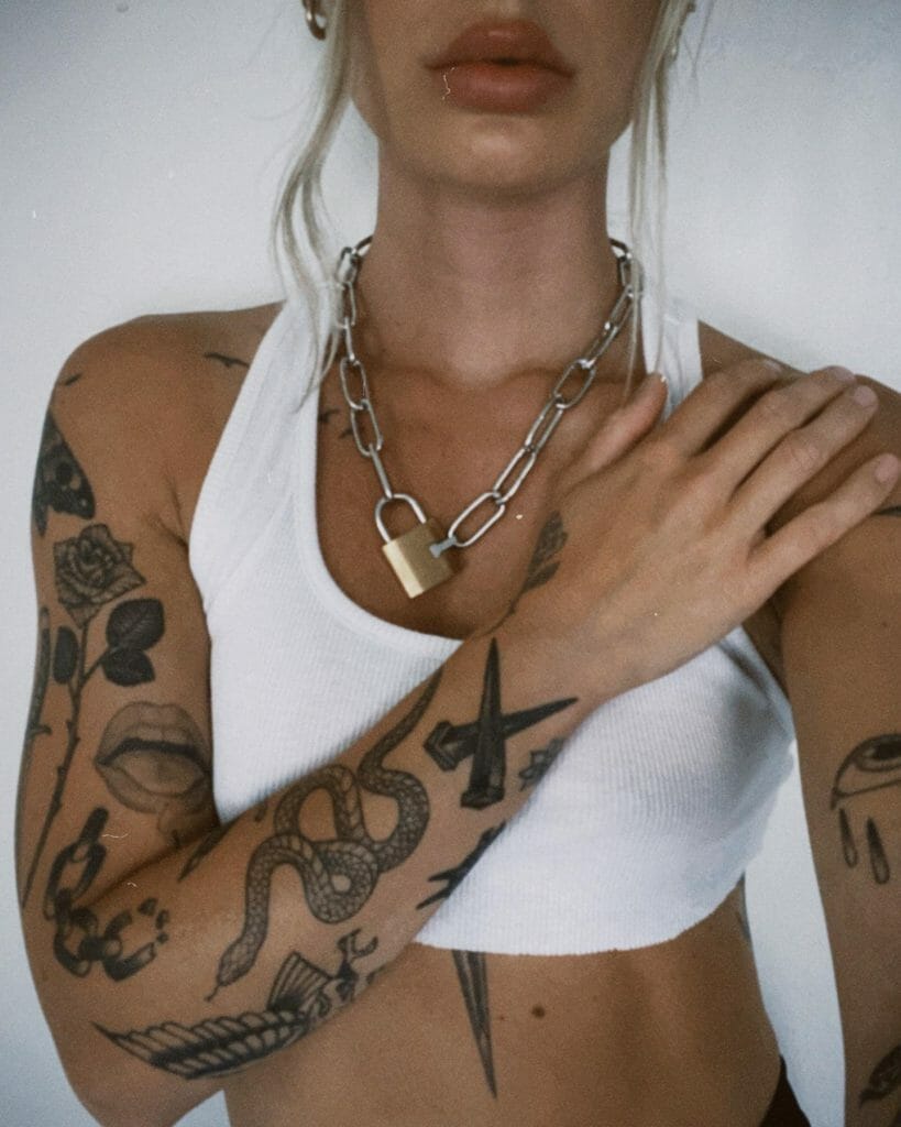 Female Minimalist Patchwork Sleeve Tattoo