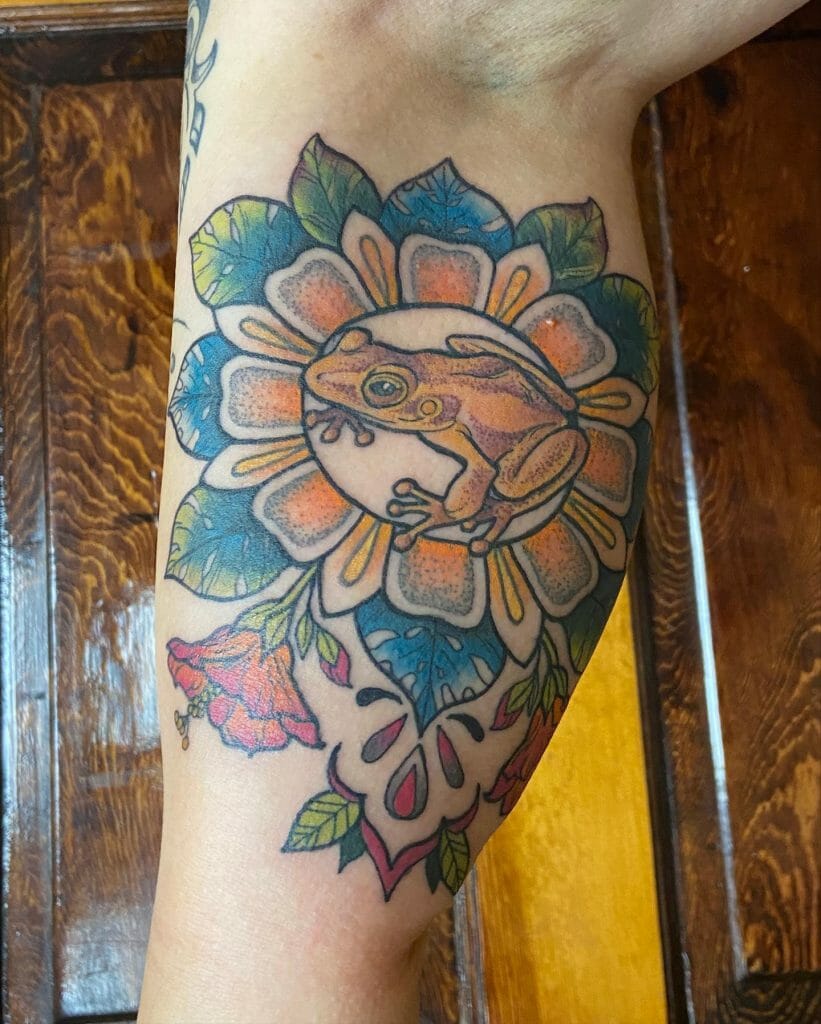Floral Design And Frog Calf Tattoo