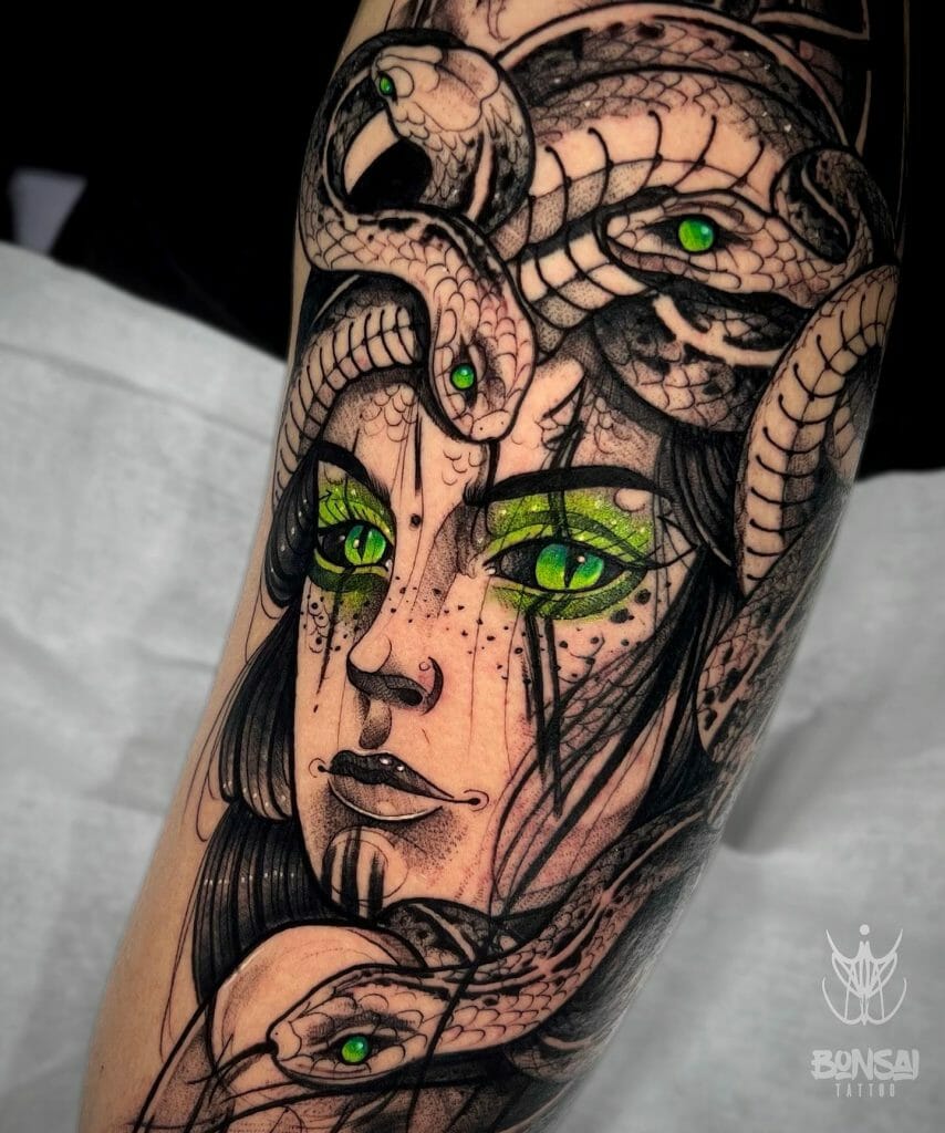 Green And Black Medusa Hand Tattoo