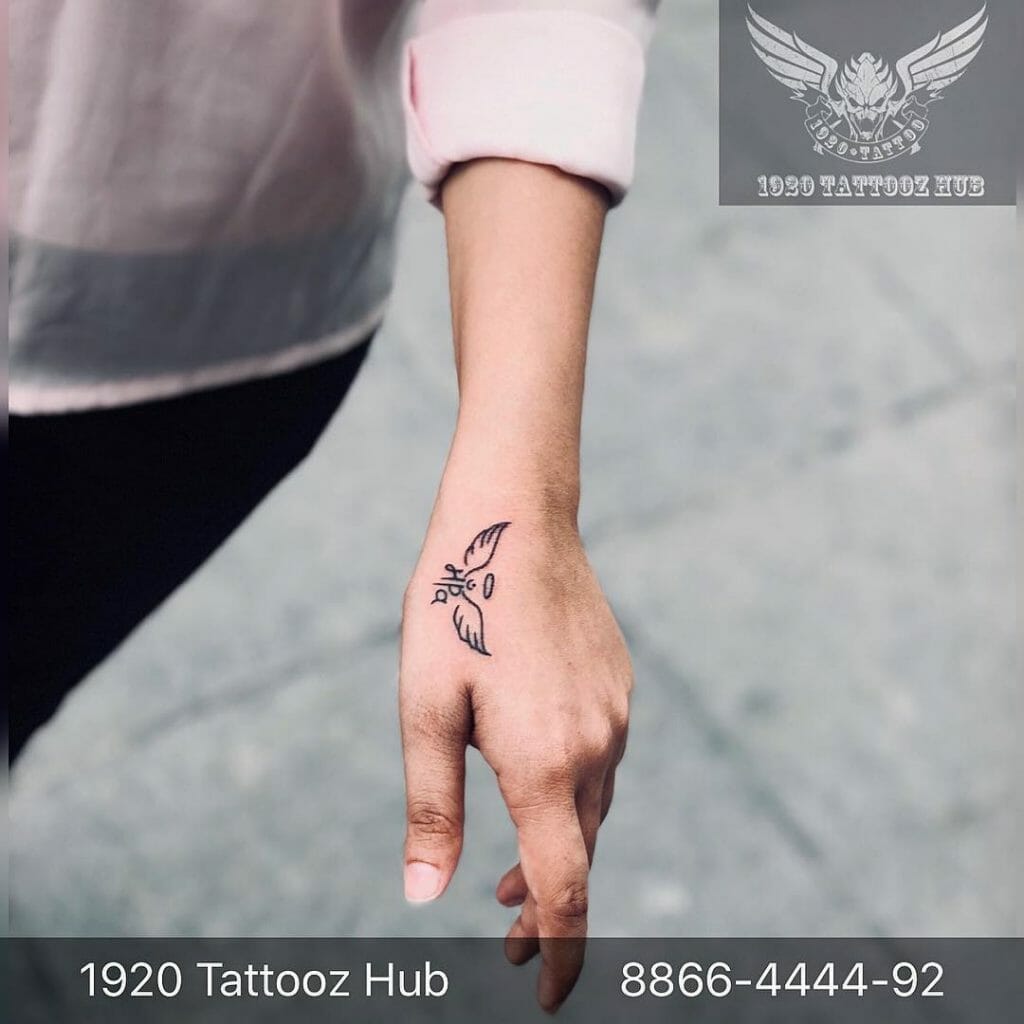 Hand Angel Wing Tattoos