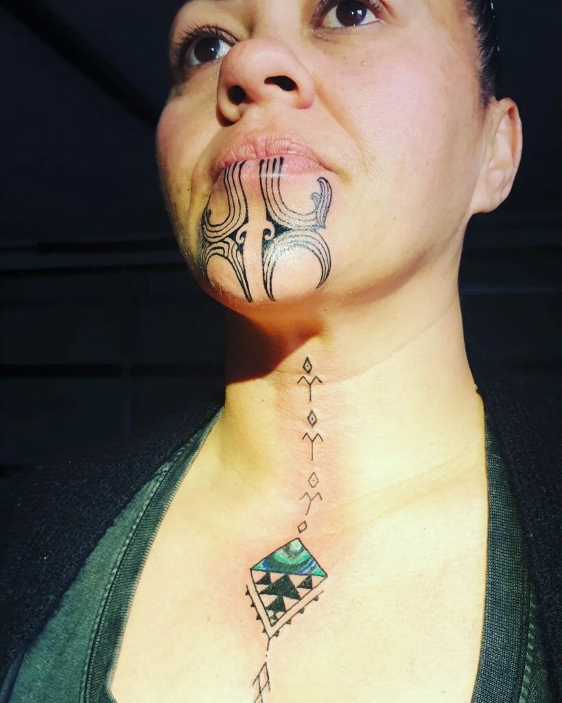 Maori Chin And Neck Tattoo