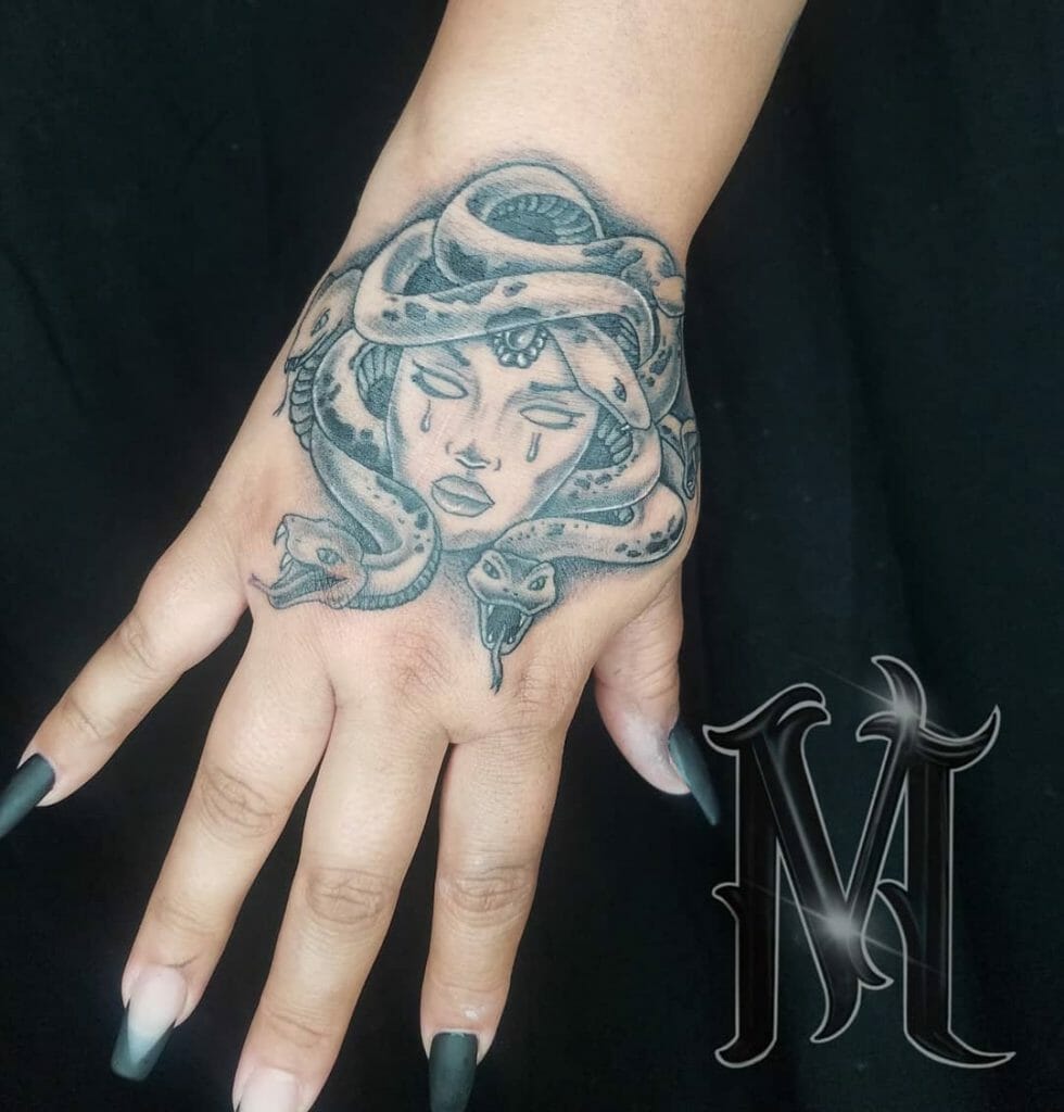 Medusa Crying Hand Tattoo