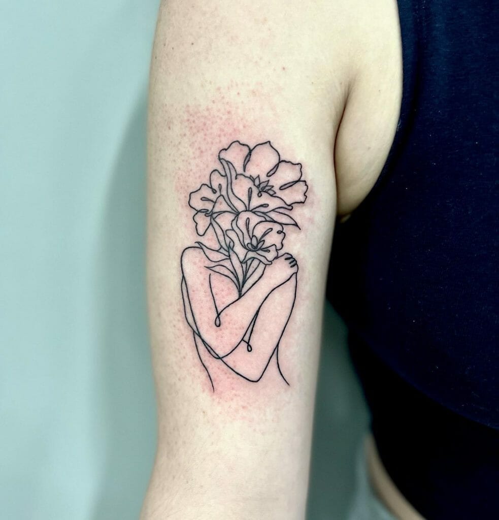 Minimalist Woman Tattoo With Flowers