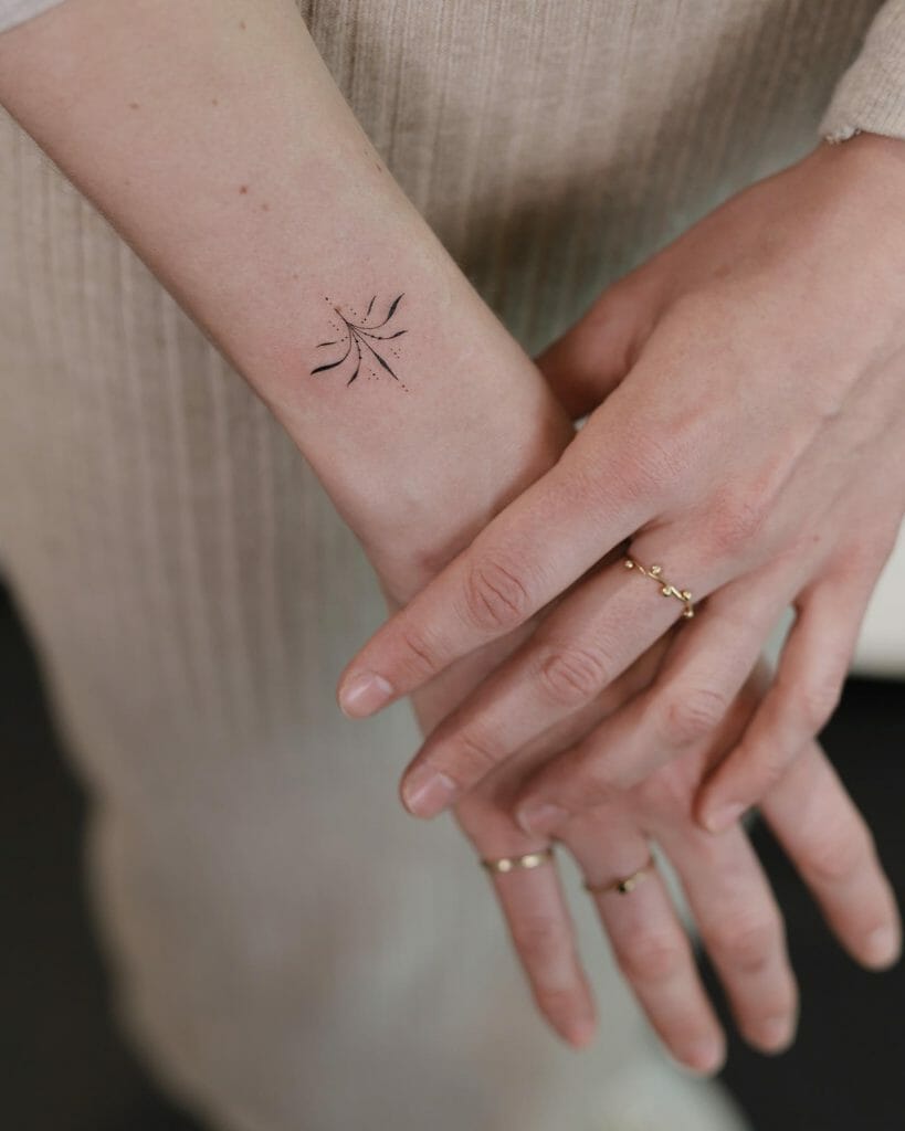 Minimalistic Plant Hand Tattoo For Girls