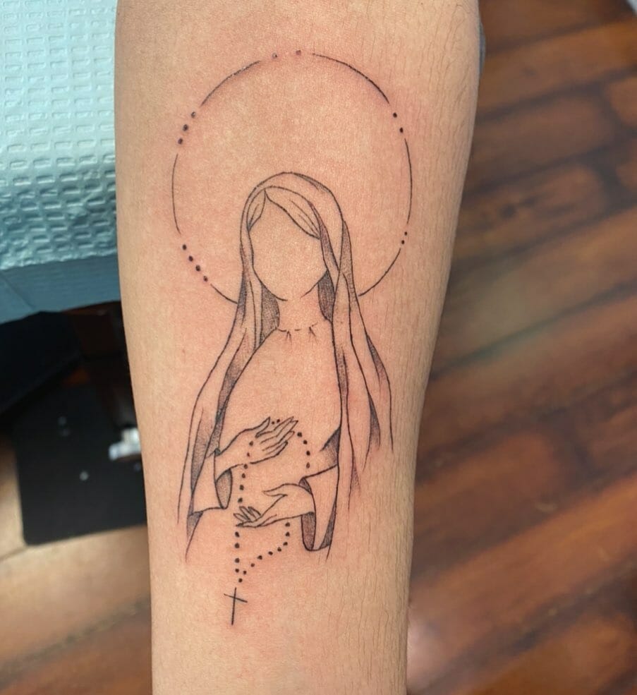 Minimalistic Virgin Mary Tattoo