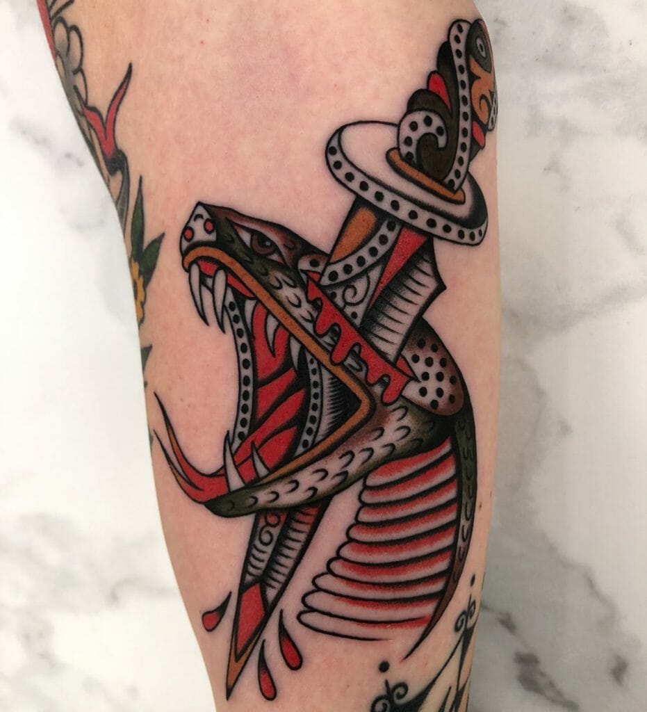 Red & Black Snake And Dagger Tattoo