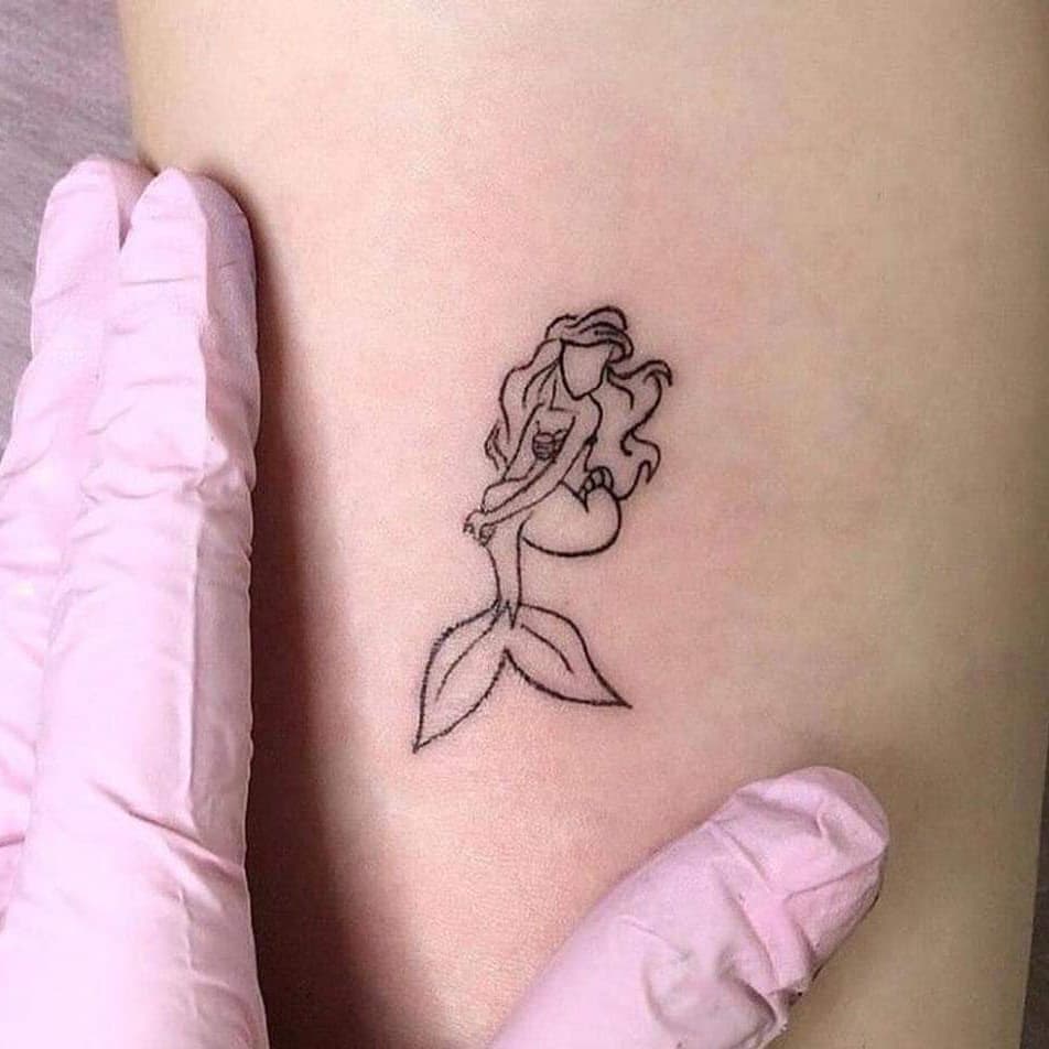 Simple Little Cartoon Mermaid Tattoo