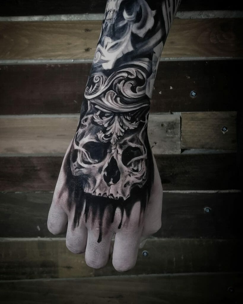 Skull Hand Tattoo Designs