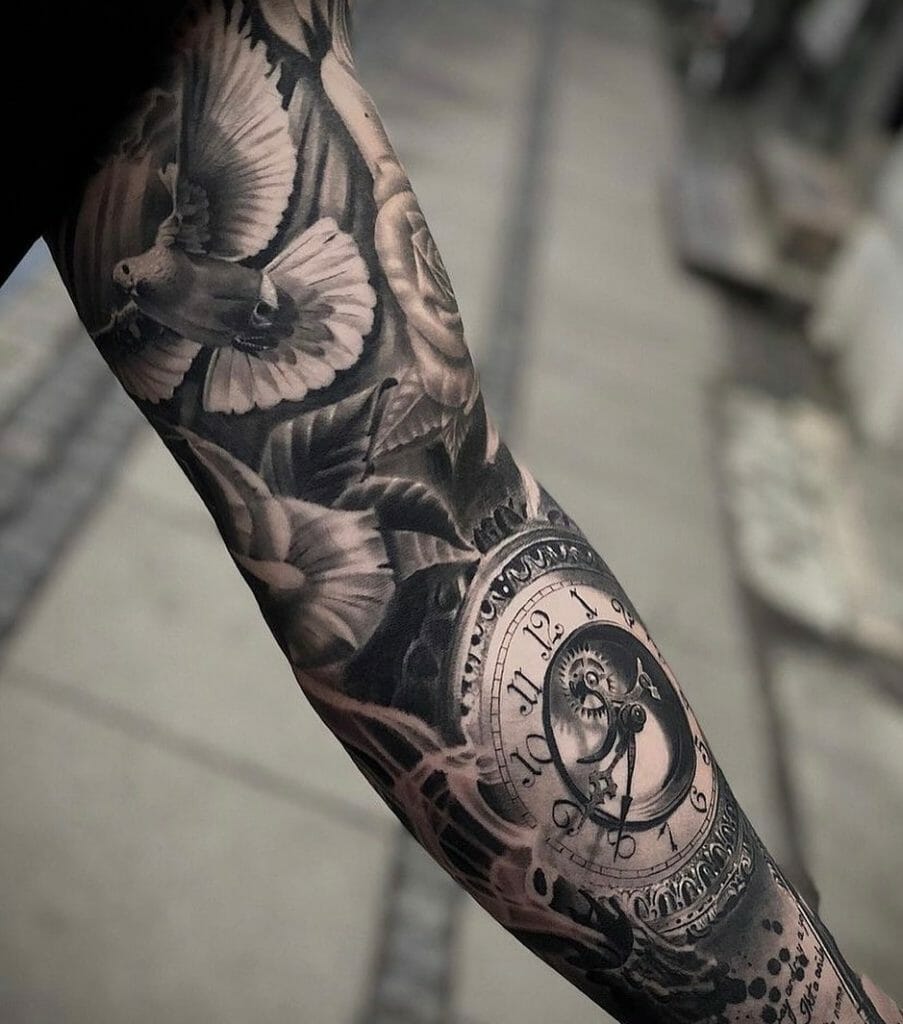 Sleeve Tattoo Of A Dove, Flowers, And A Beautiful Clock