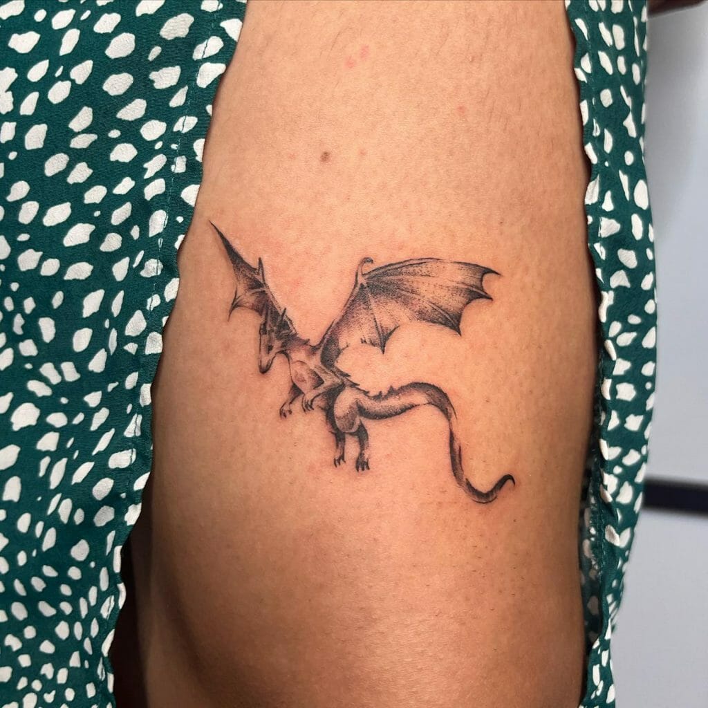 Small Dragon Thigh Tattoo