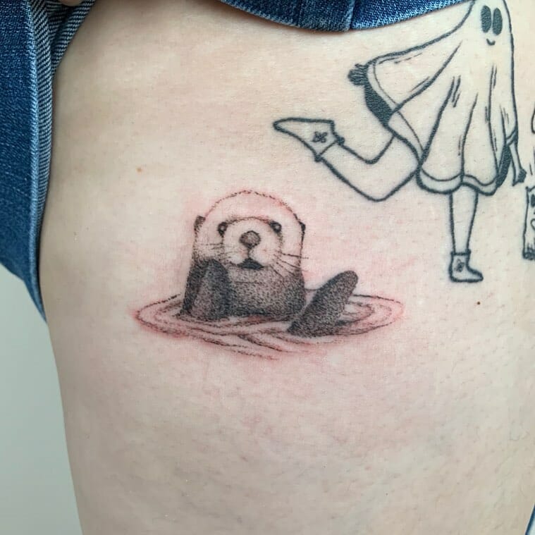 Small Otter Tattoo In Water