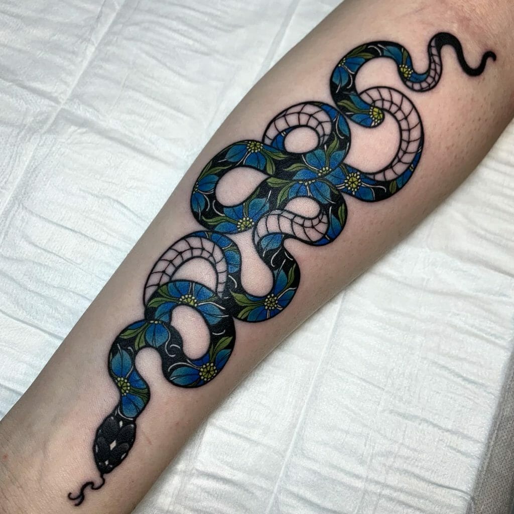 Snake Tattoo Design With Black Ink And Blue Flowers