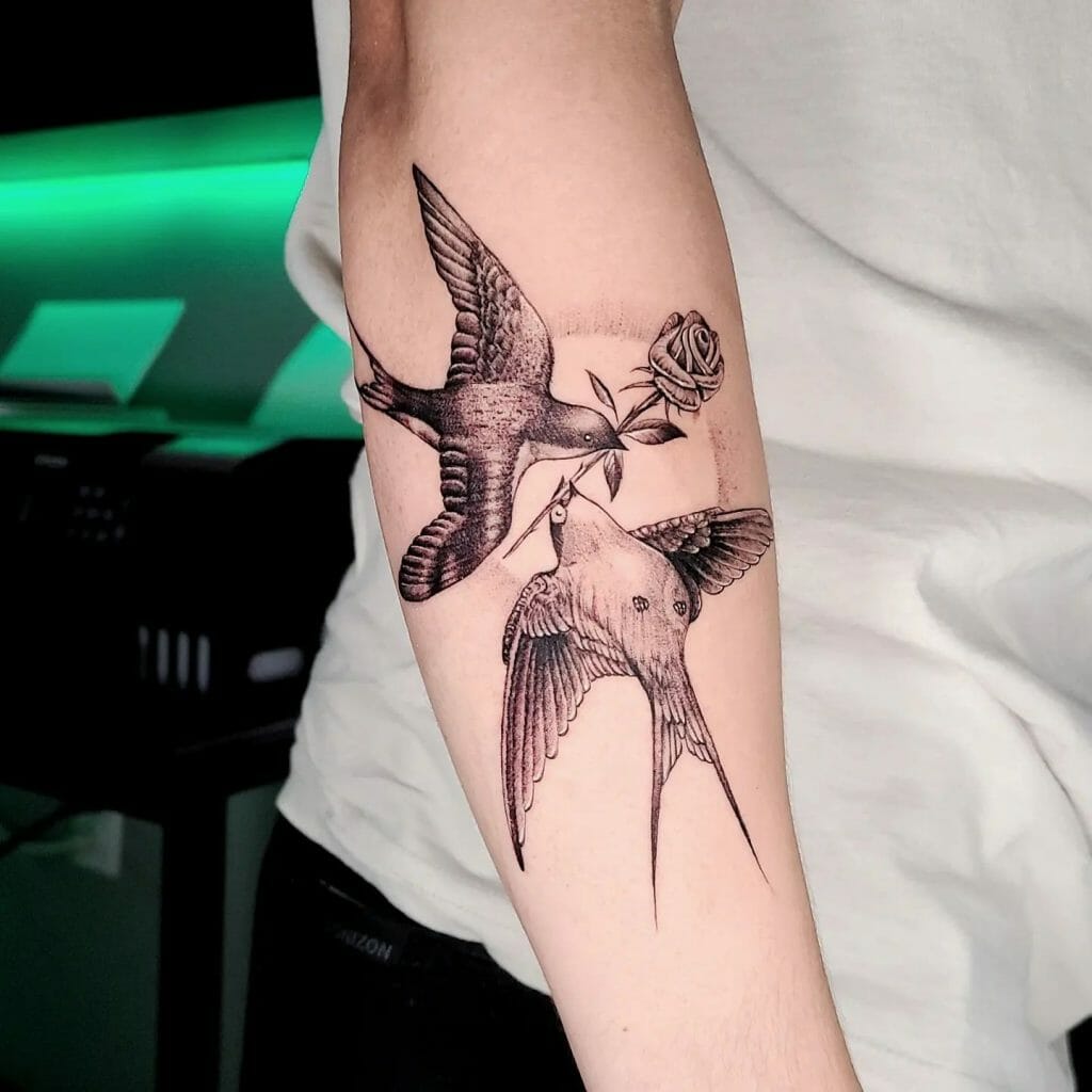 Swallow With A Rose Hand Tattoo