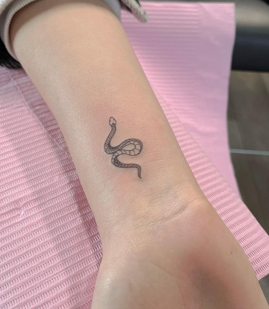 The Minimalist Snake Tattoo On The Wrist