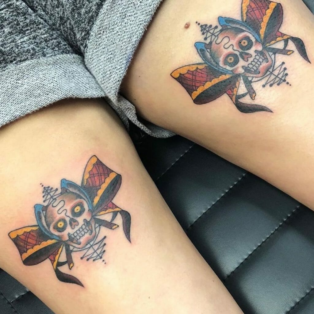 Unique Bow Tattoo Style With Skulls