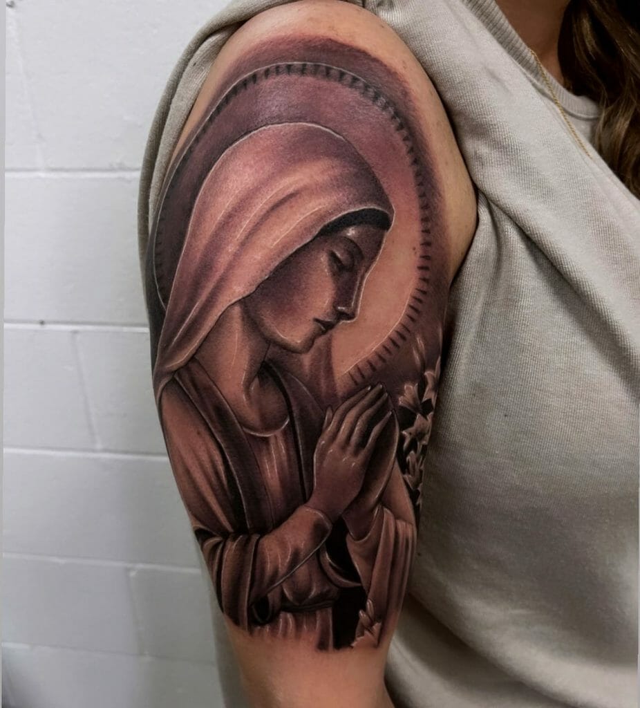 Virgin Mary Tattoo Praying On The Forearm