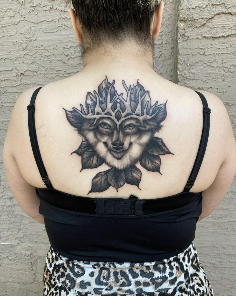 Wolf Tattoo On The Upper Back