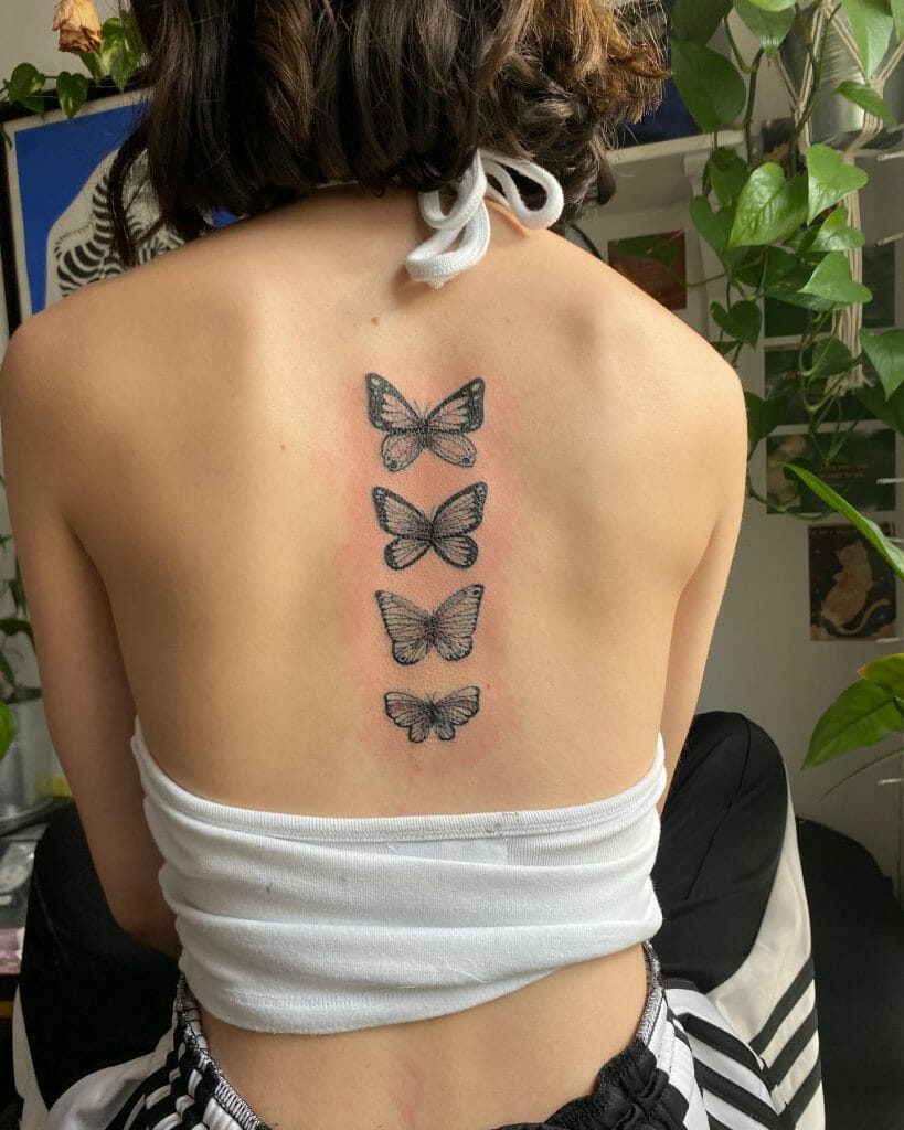 Women's Butterfly Back Tattoo On Back