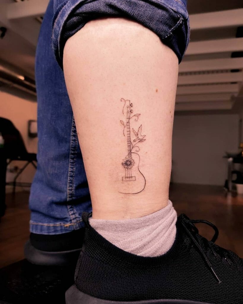 Simple Small Guitar Tattoo