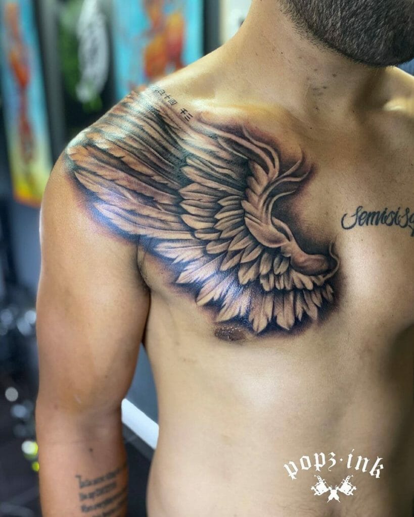 Beautiful Half Wings Tattoo On The Chest