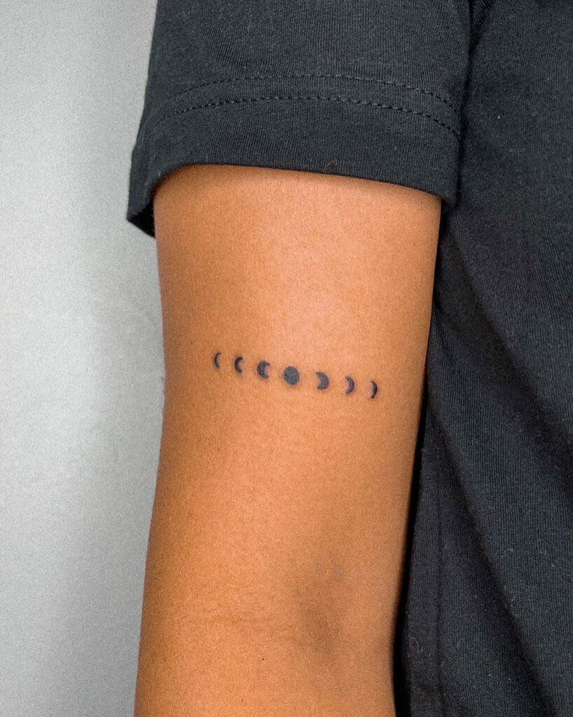 Simple and Elegant Moon Phases Tattoo Spine