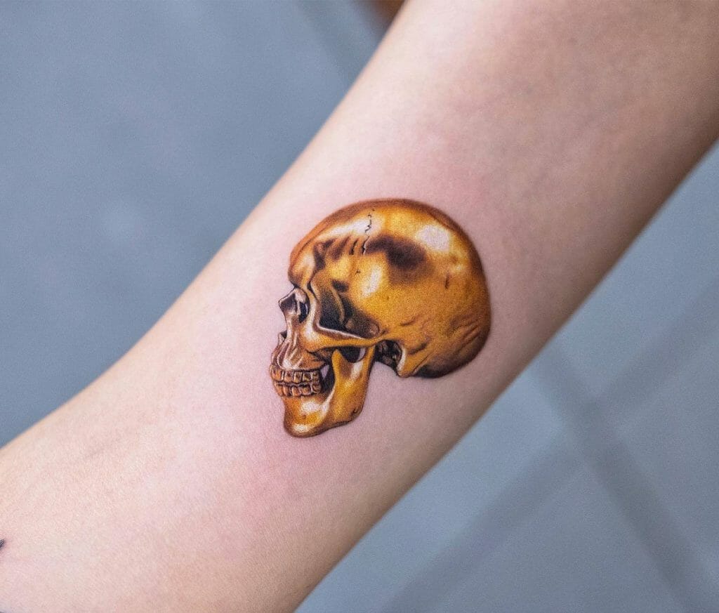 Beautiful Golden Small and Simple Skull Tattoos