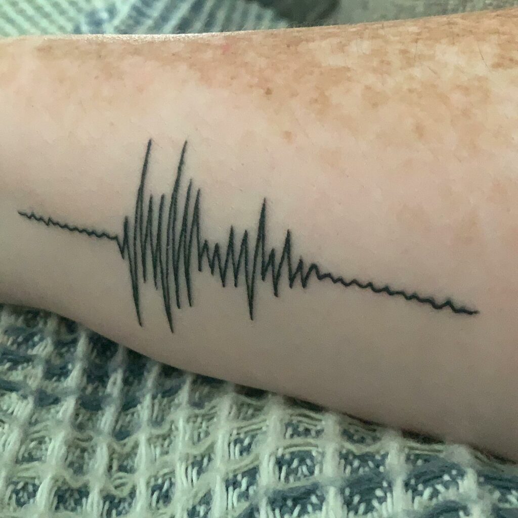 minimalist sound wave tattoo