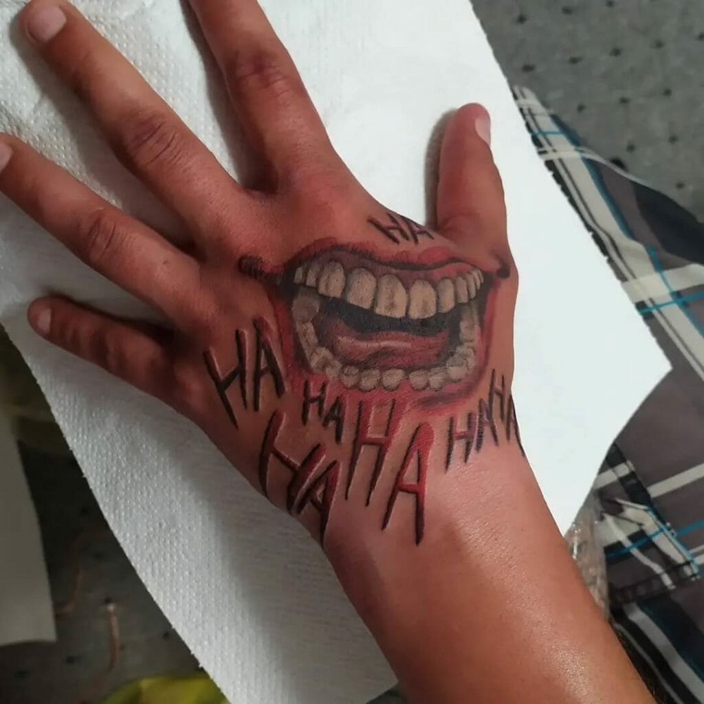 Joker Smile Hand Tattoo