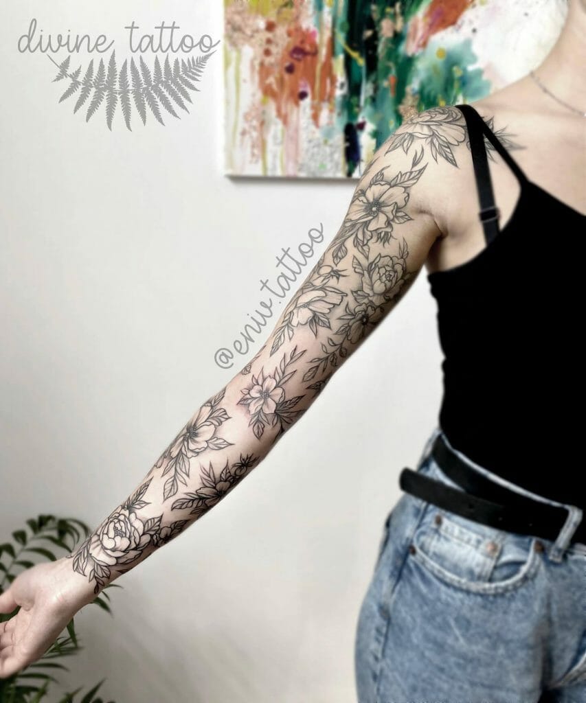 Beautiful Sleeve Type Arm Flower Tattoo In Black