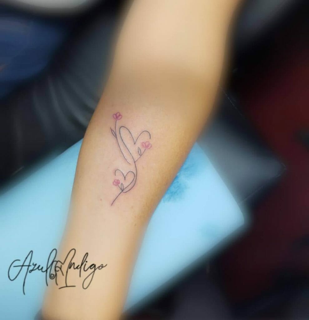 Tiny Hearts And Flower Tattoo
