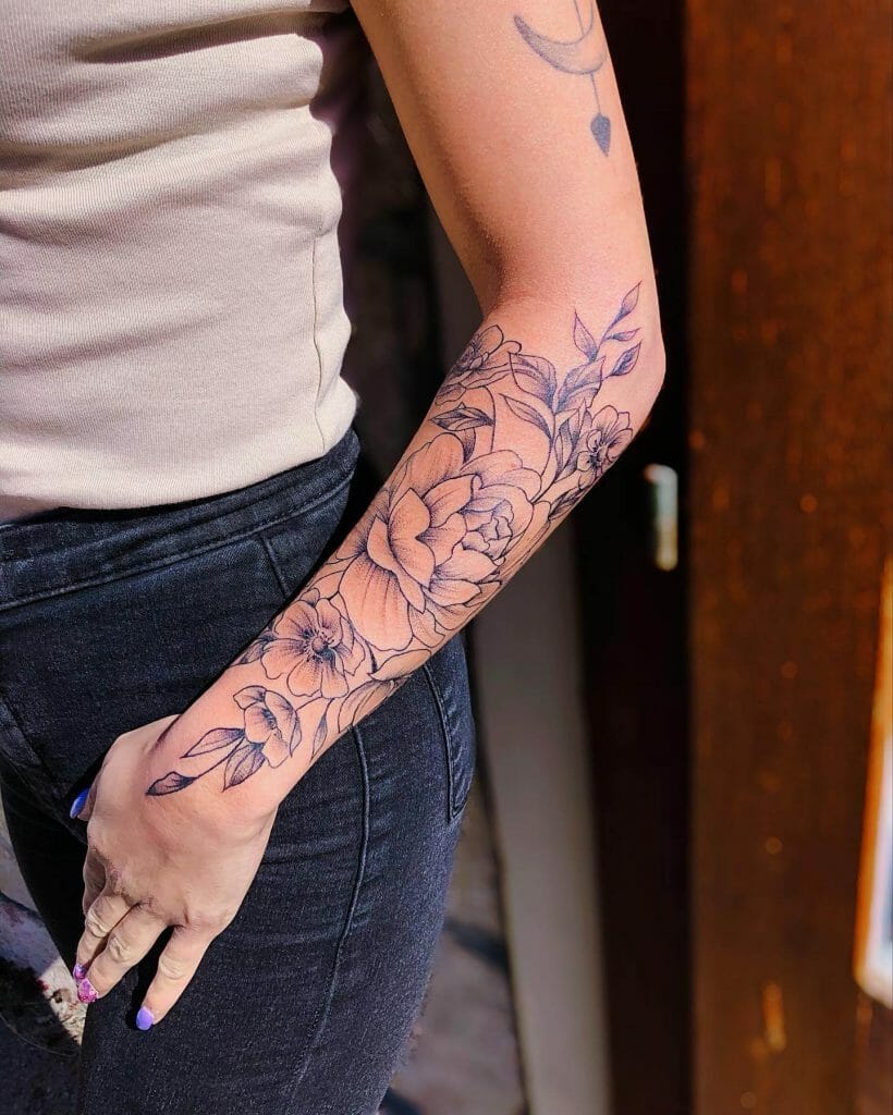 Cute Small And Big Arm Flower Tattoo