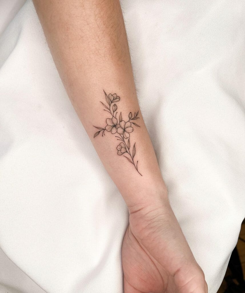 Meaningful Feminine Cross With Flowers Tattoo