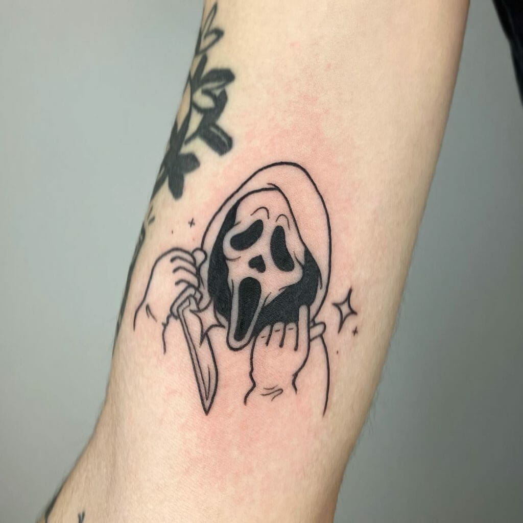 Small Ghost Face Tattoo Idea