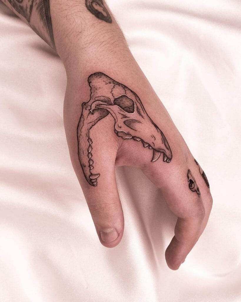 Simple Animal Skull on Hand Tattoo