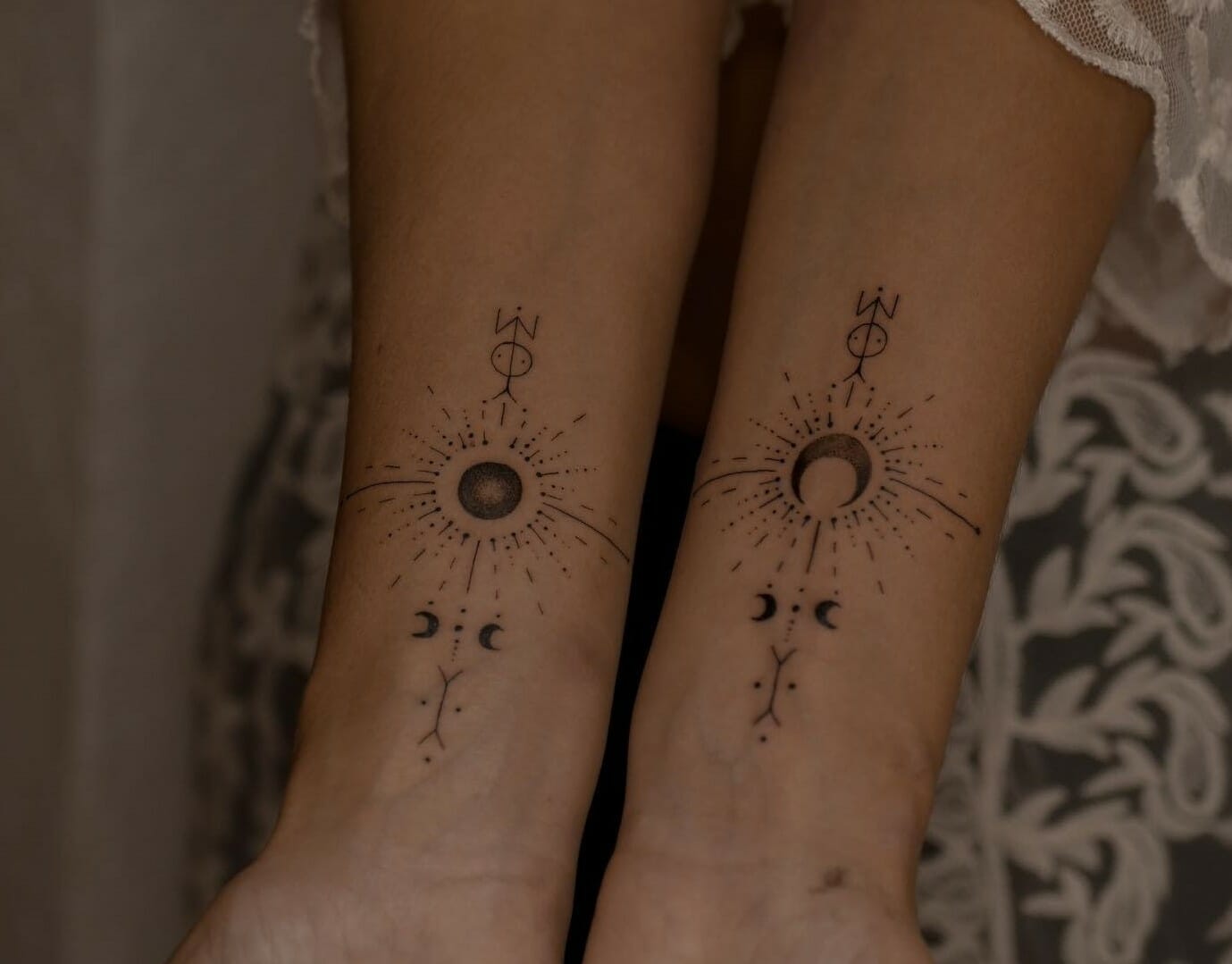 Moon phase tattoos in the spine