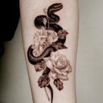 Snake sternum Tattoos