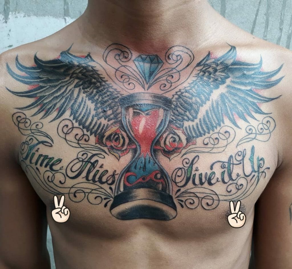 Full Angel Wings Chest Tattoo With An Hourglass And A Quote