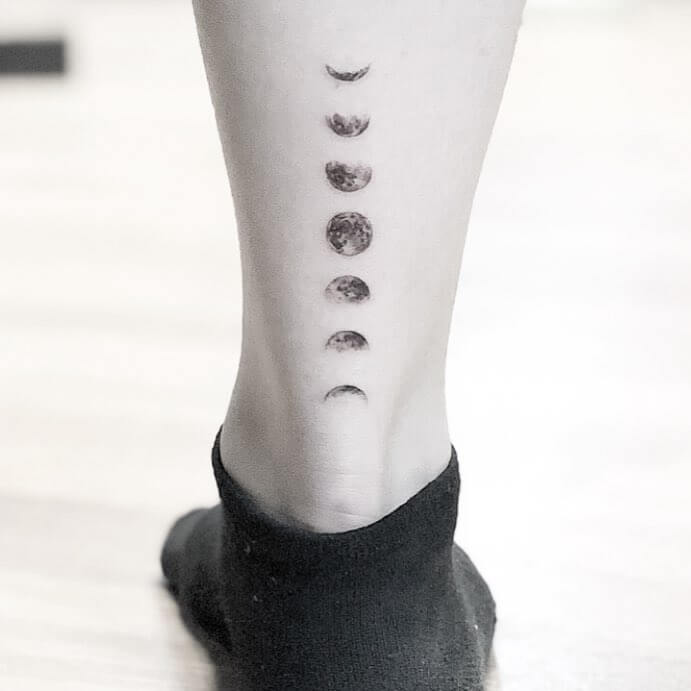 Subtle Moon Phase Tattoo in Black Shading