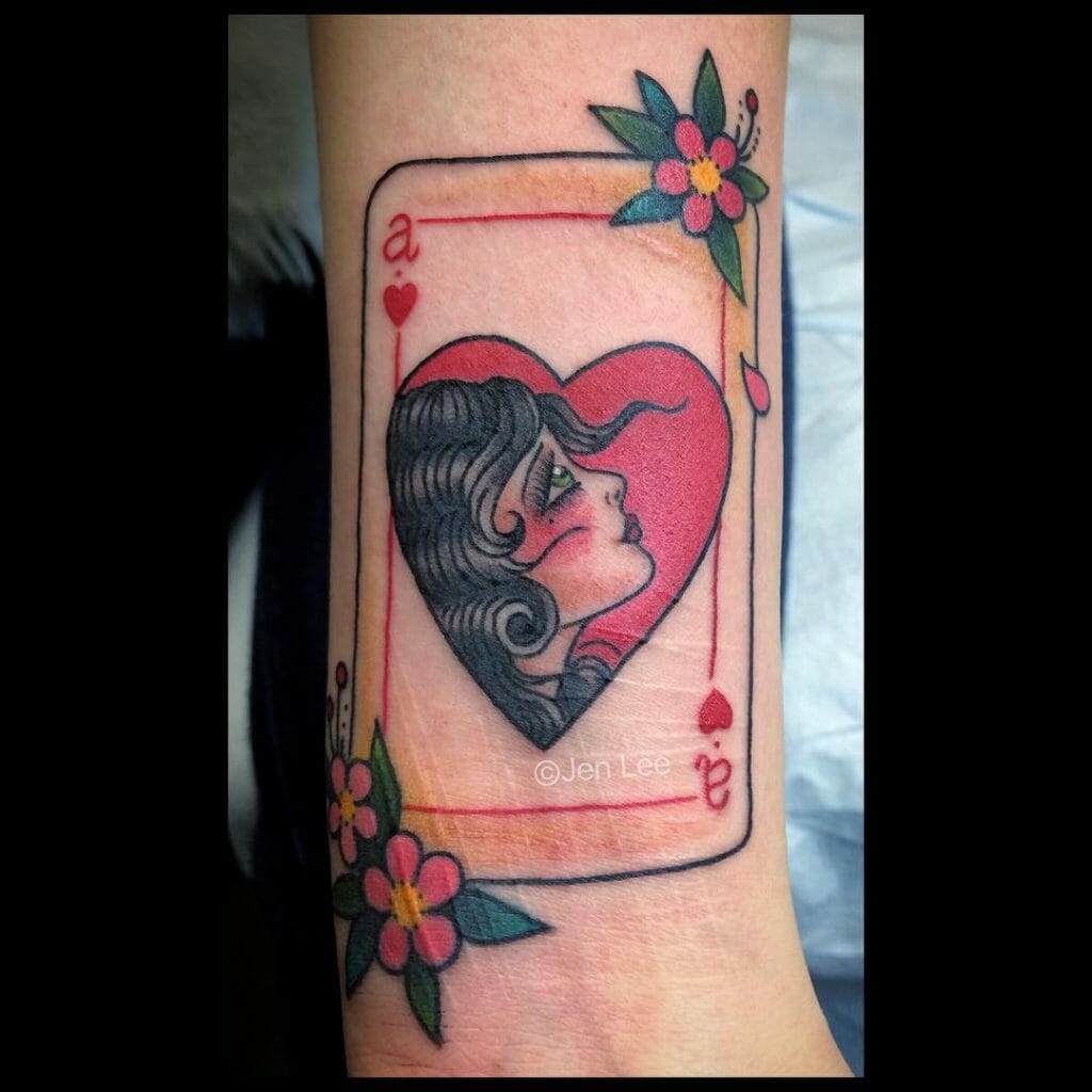 A Tattoo Of Ace Of Hearts With A Woman's Face
