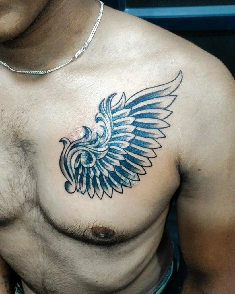 Abstract Winged Tattoo On Chest