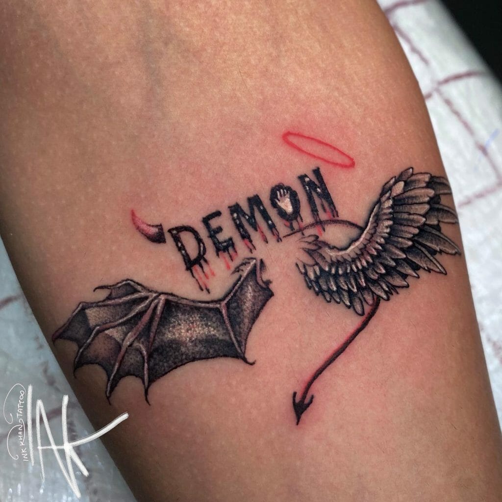 Angel Wing Tattoo Along With Demon Wing Tattoo