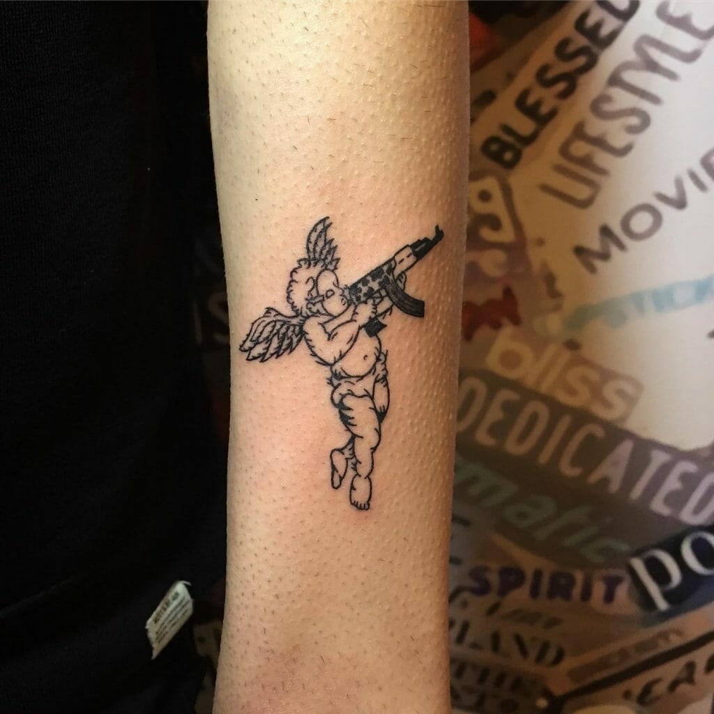 Angel With Gun Tattoo